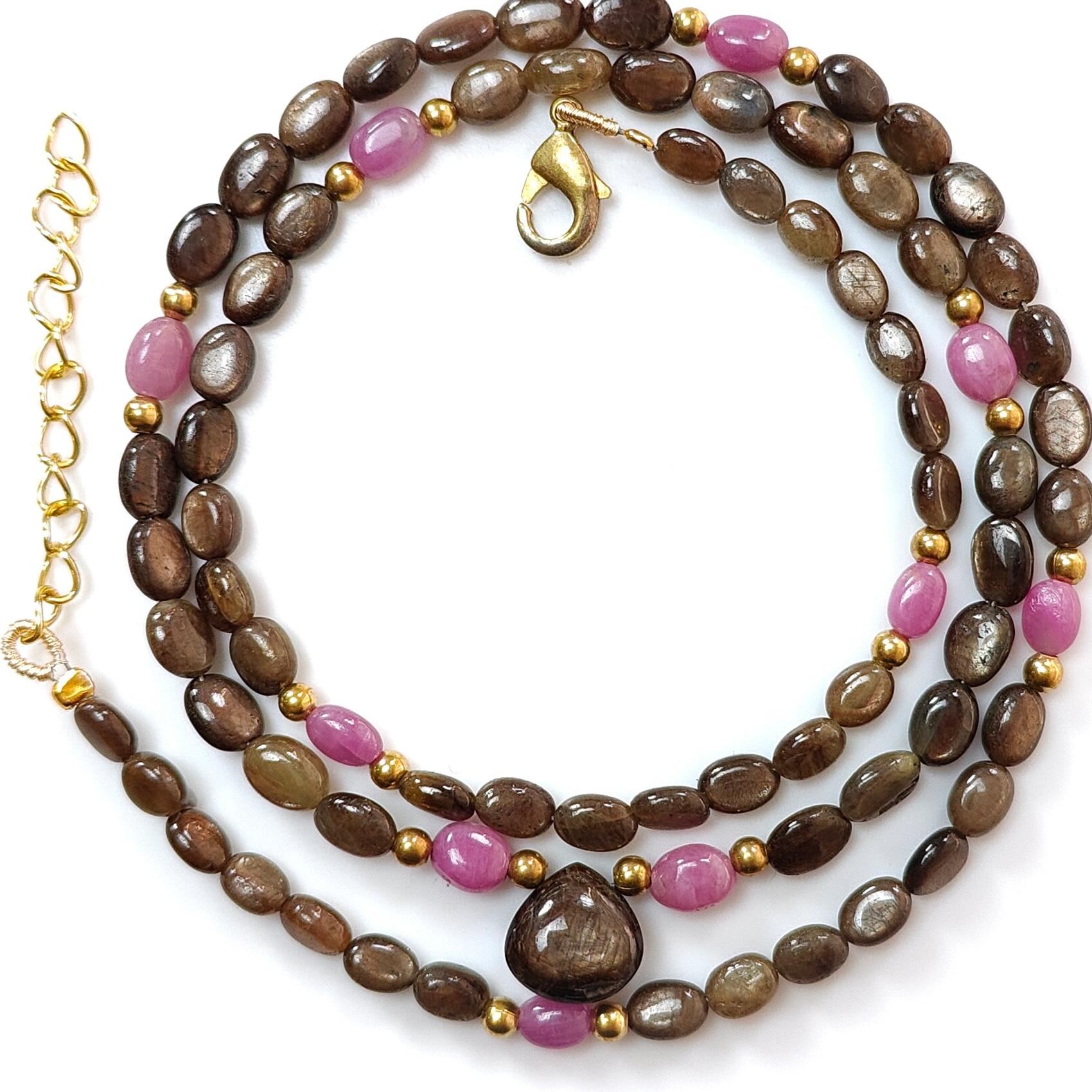 Golden & Pink Sapphire Oval Plain Brass Necklace: 18.04gms Golden & Pink Sapphire Oval Plain Brass Necklace 5*4mm-7*5mm ,10mm 21"( Apx)